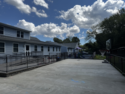Commercial concrete walkway cleaning at a business property