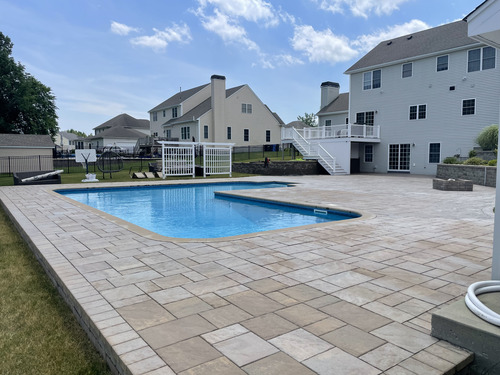 Clean patio and pool area after professional cleaning